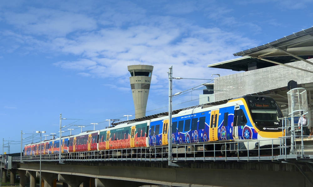 Brisbane Airport to Gold Coast Hotels Train and Chauffeured Vehicle Package