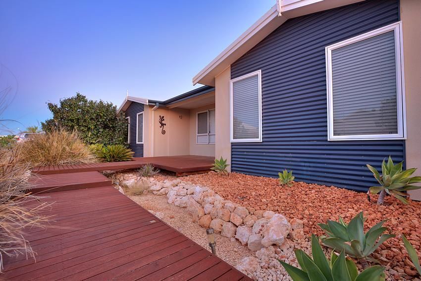 Swimming Pool and Boat Jetty. Beautifully Equipped Family Home