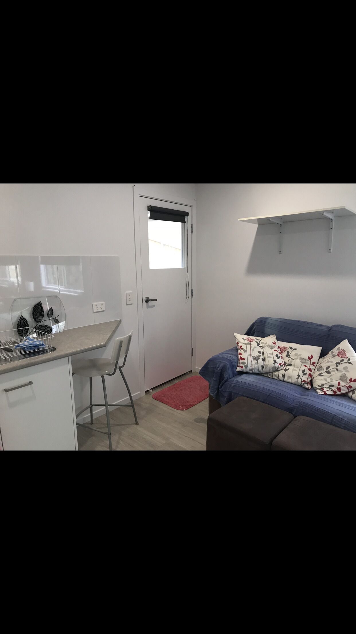 Fully self contained studio apartment with separate laundry/bathroom.