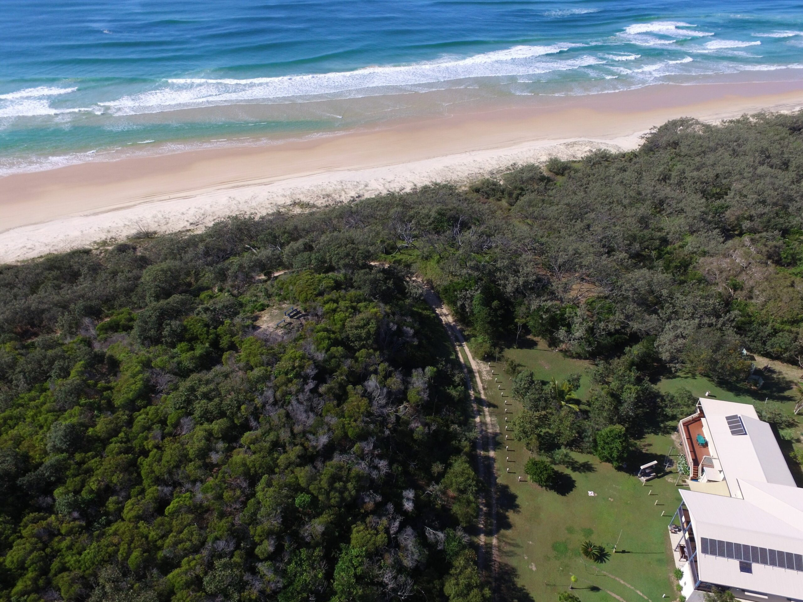 Pipis at Poyungan, "The Dunes" one of the few beachfront homes on Fraser island