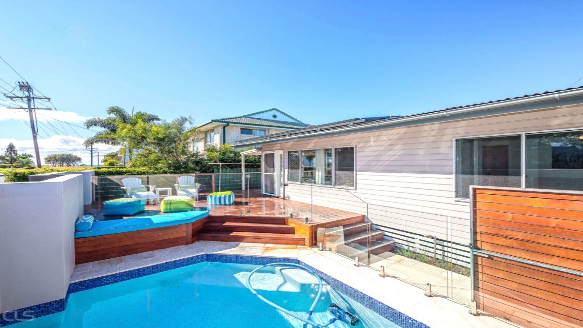 A BEACHSIDE BEAUTY WITH POOL