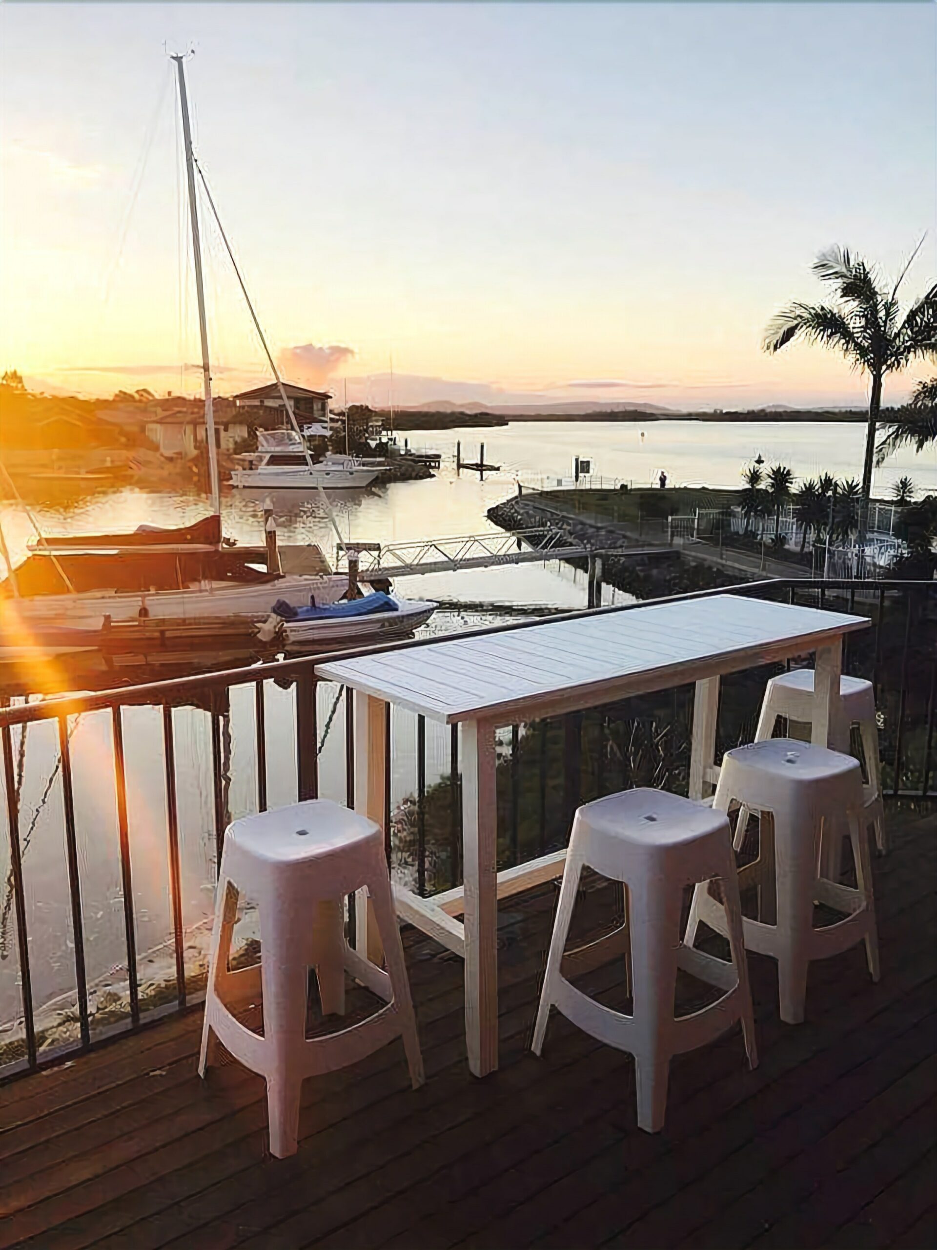 Stunning double story beach house on the waterfront with a pontoon and swimming pool!