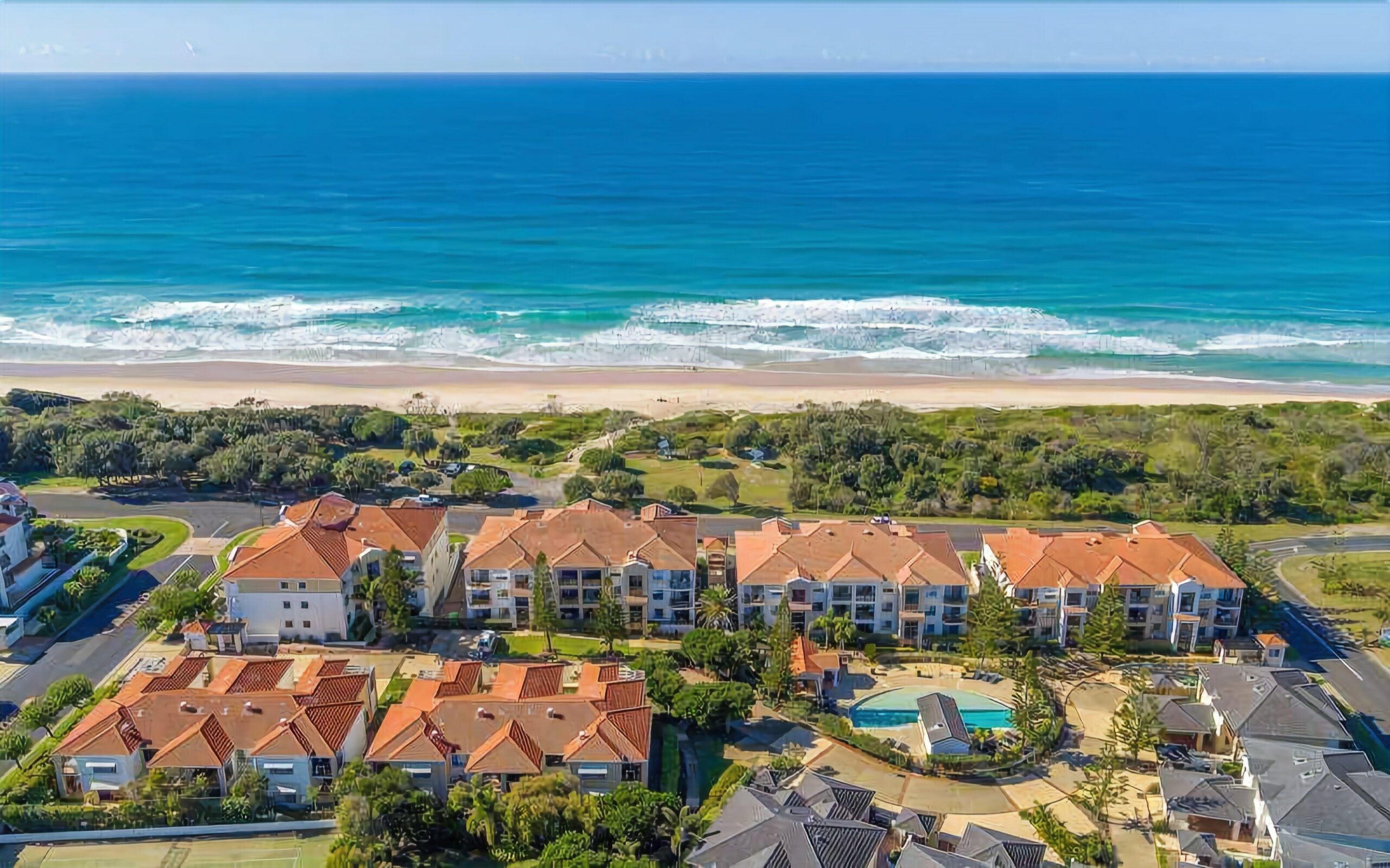 Elevated ground floor unit with ocean views in the Sands Resort!