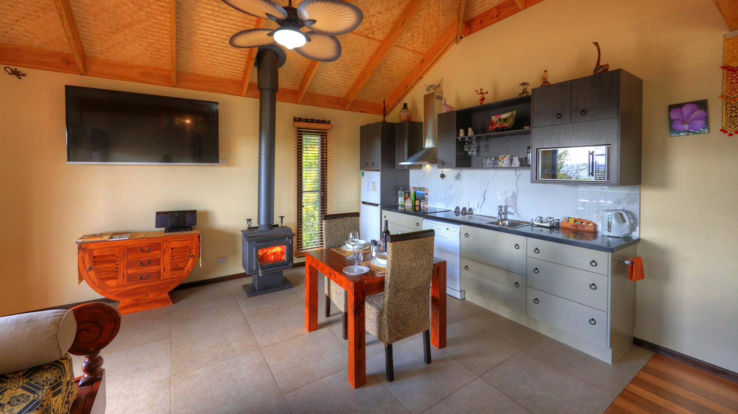 Luxury self-contained villa with double bed, double spa, fireplace, and kitchen.