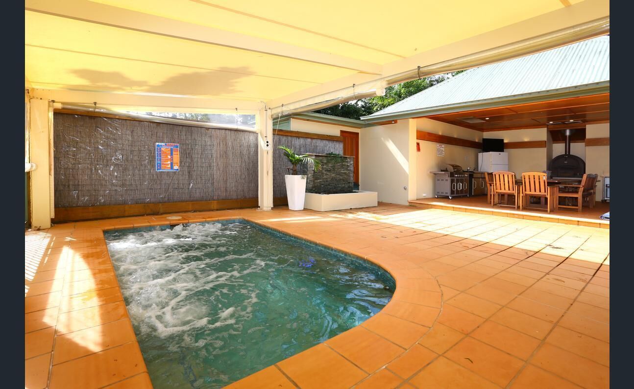 Sleeps 14 & has 4 bathrooms, pool table, pizza oven, spa pool, wood heater