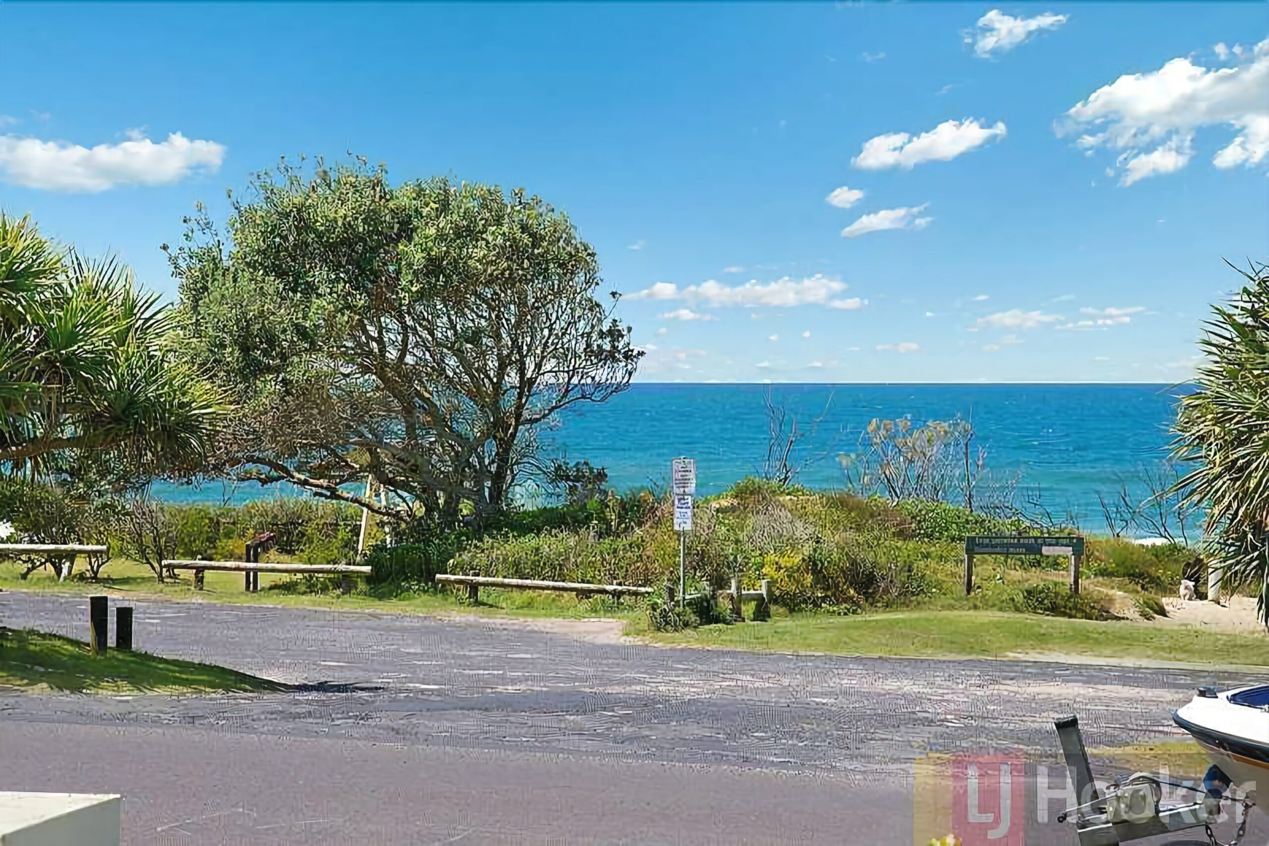 Elevated ground floor unit with ocean views in the Sands Resort!