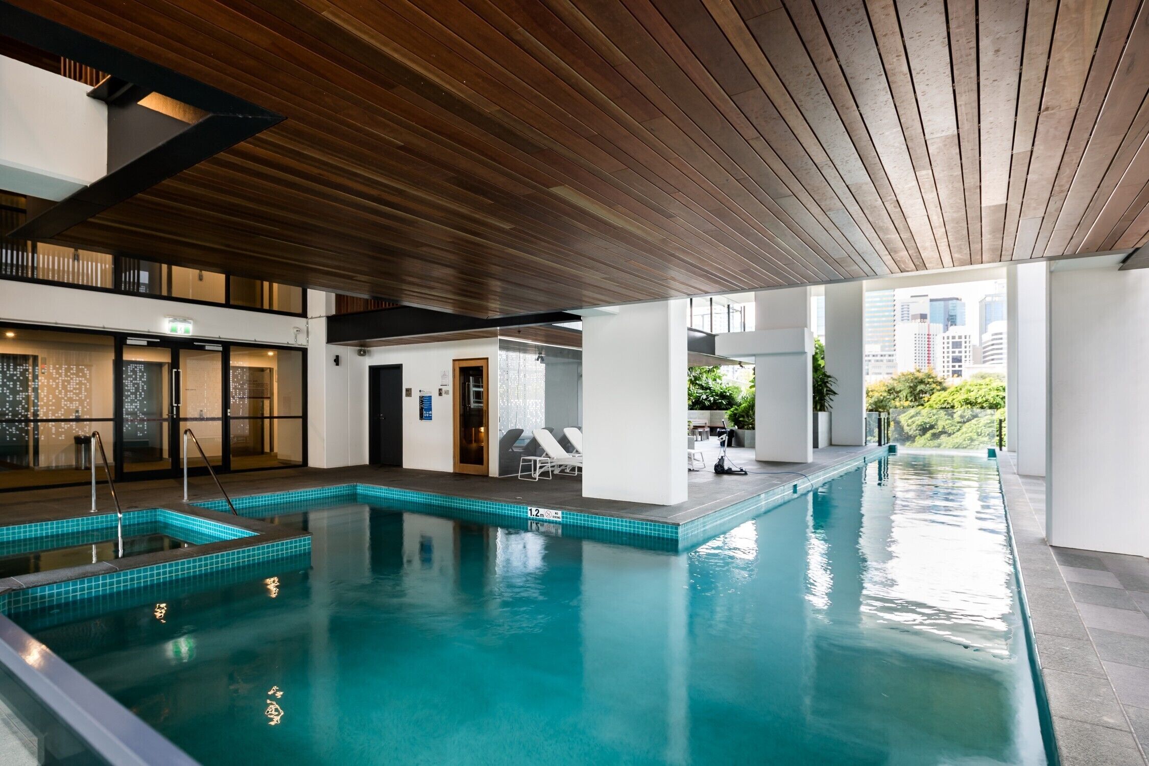 Skyline Views From a Sleek Apartment With a Heated Pool