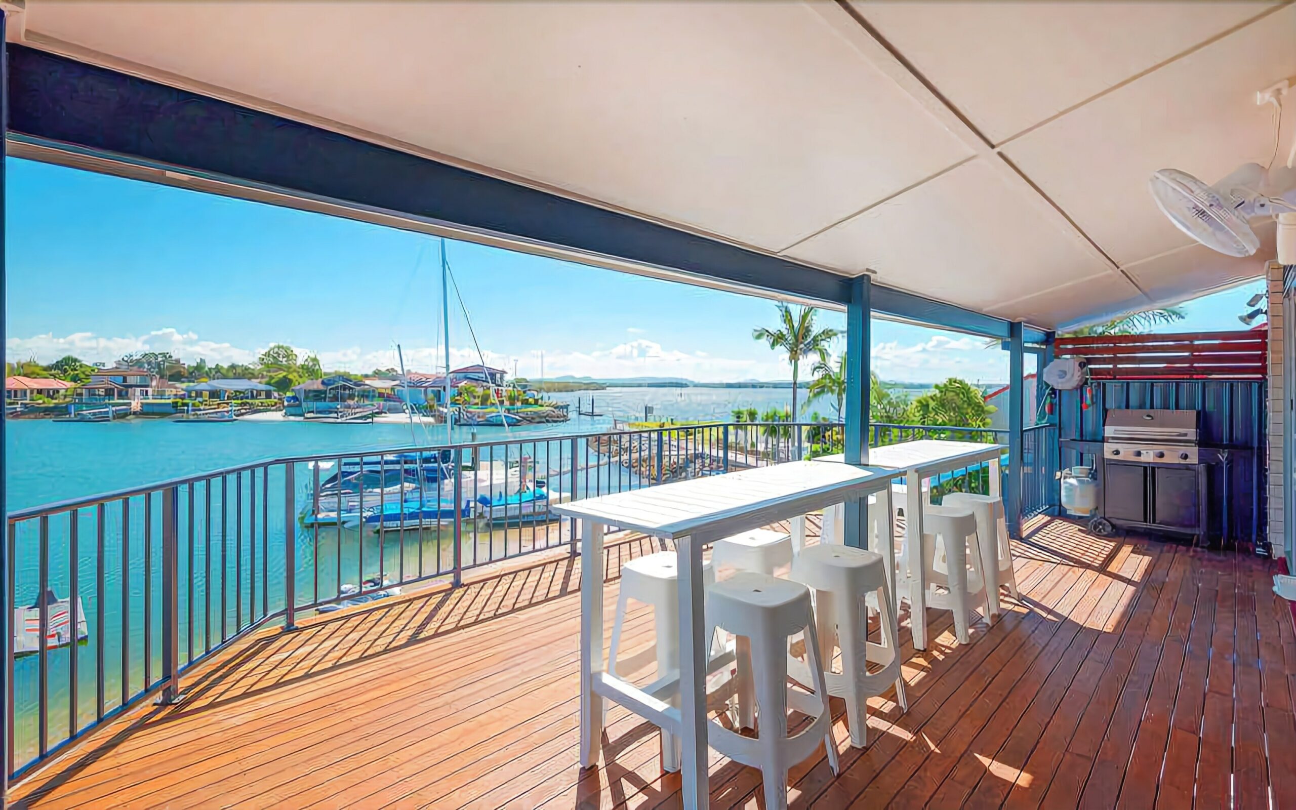 Stunning double story beach house on the waterfront with a pontoon and swimming pool!