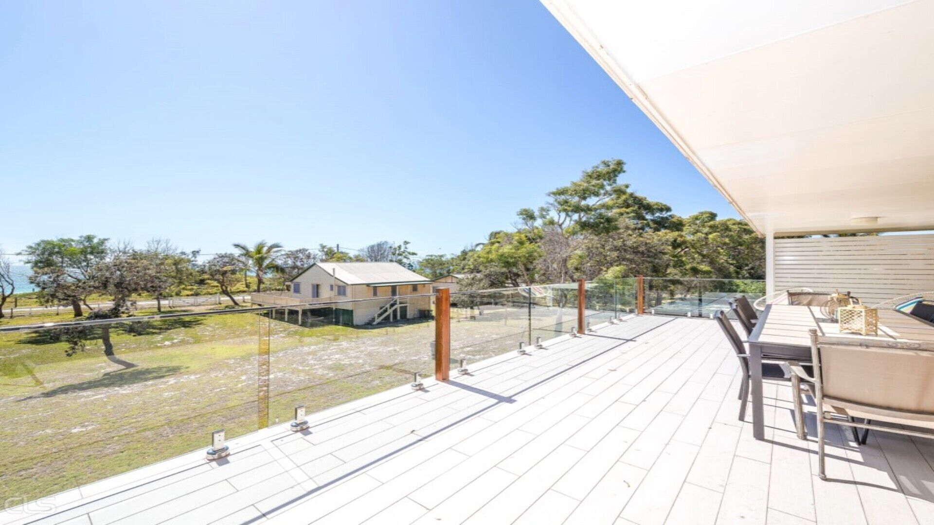 A LARGE BEACH SIDE HOME WITH WATER VIEWS