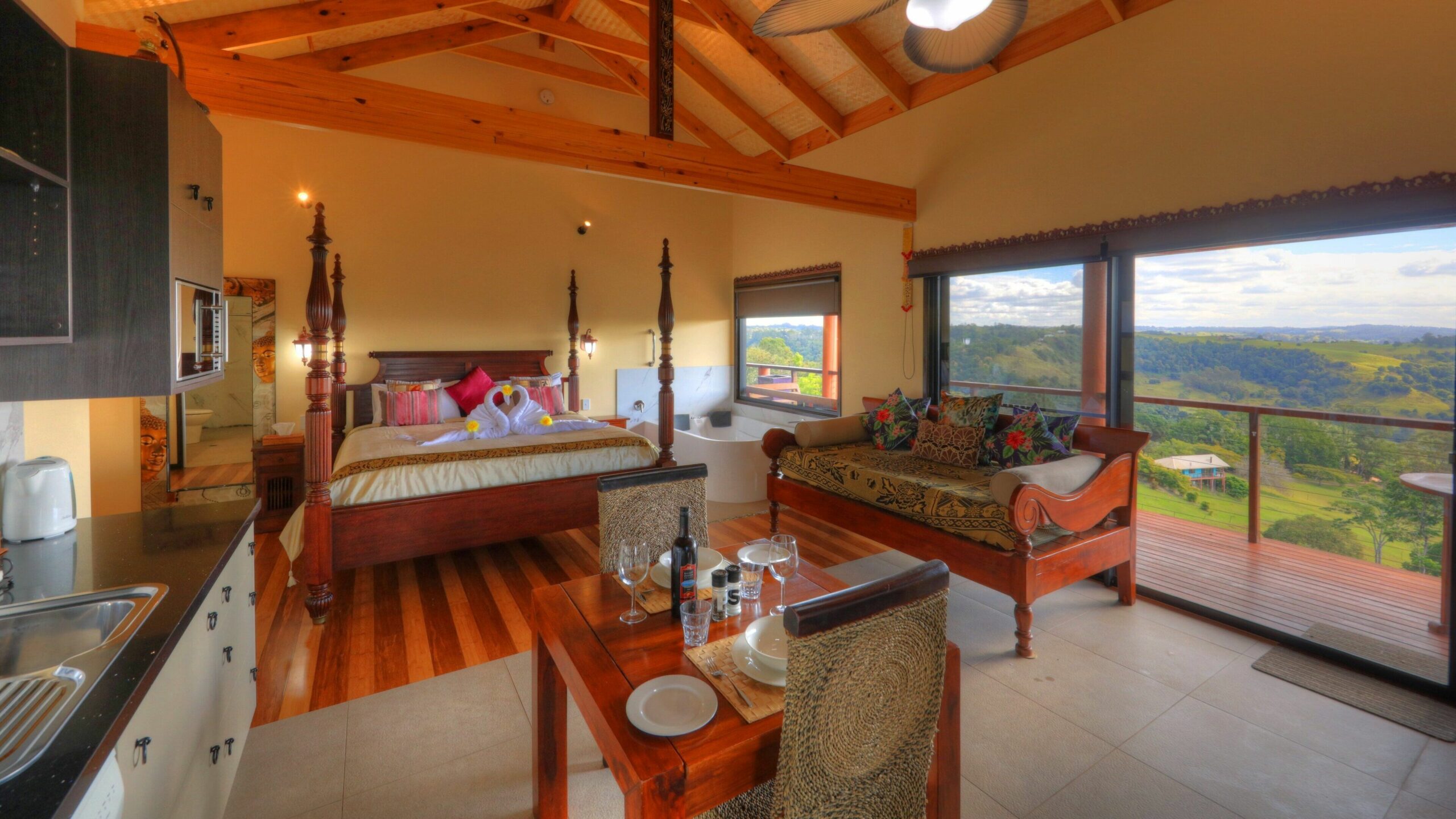 Luxury self-contained villa with double bed, double spa, fireplace, and kitchen.