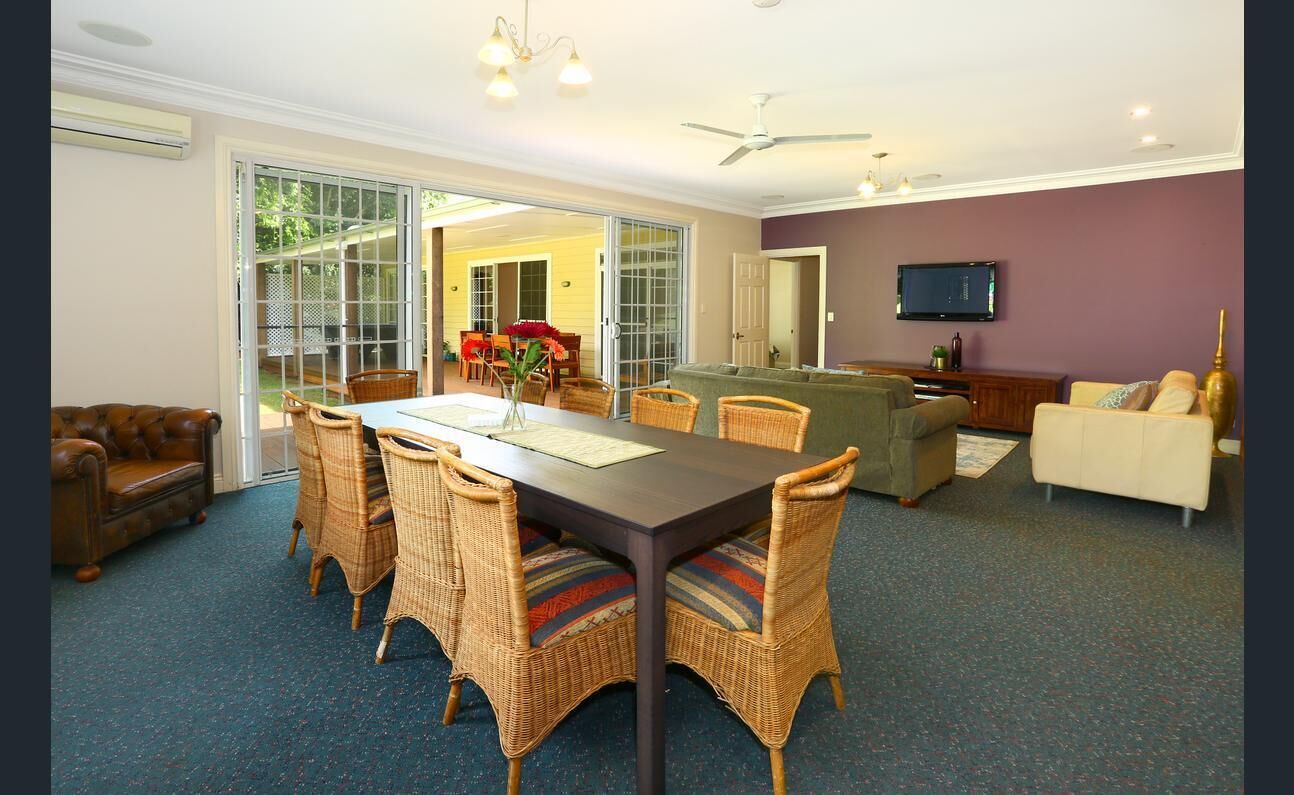 Sleeps 14 & has 4 bathrooms, pool table, pizza oven, spa pool, wood heater