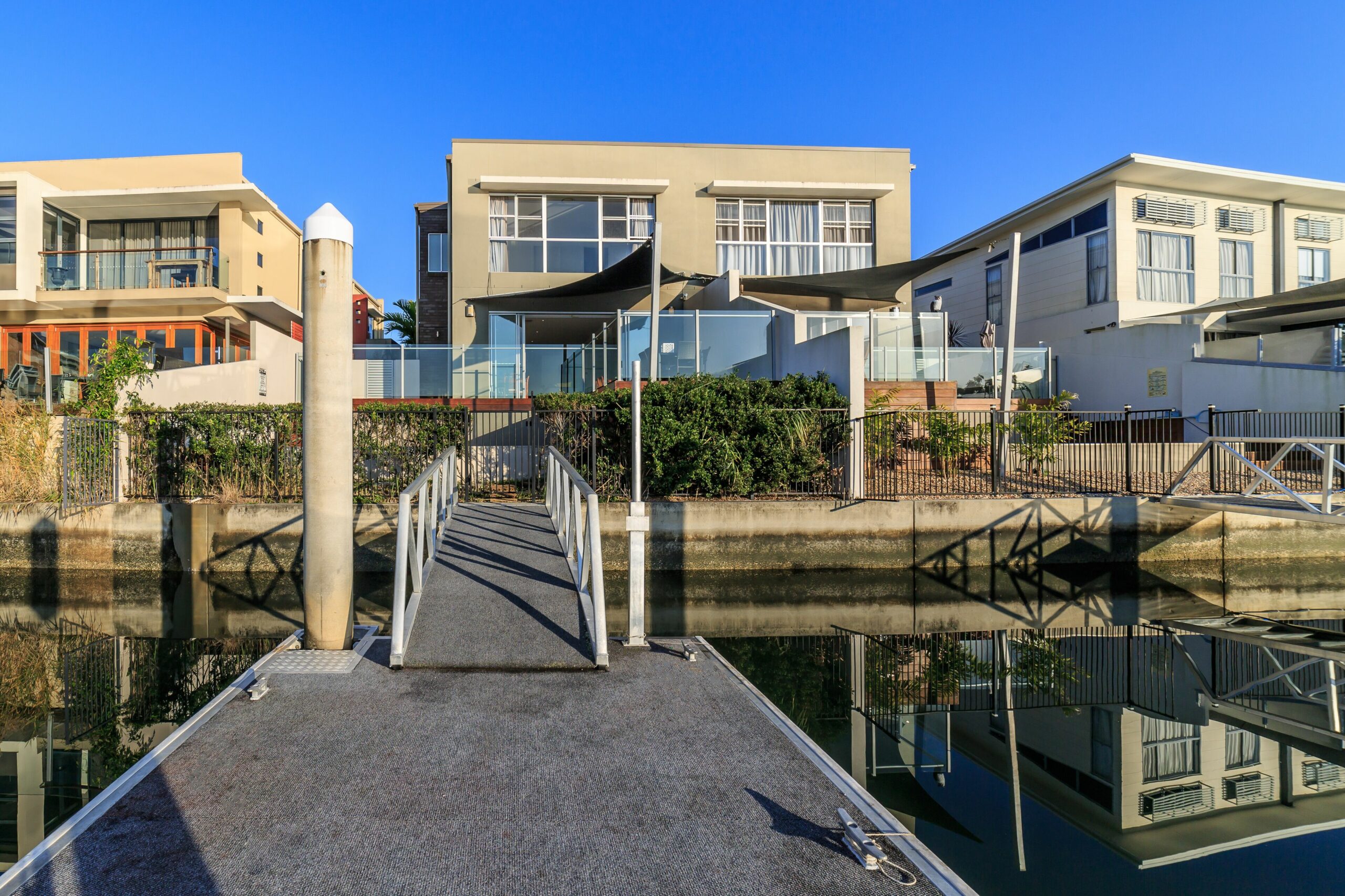 Watch the sunrise over the water from your back deck