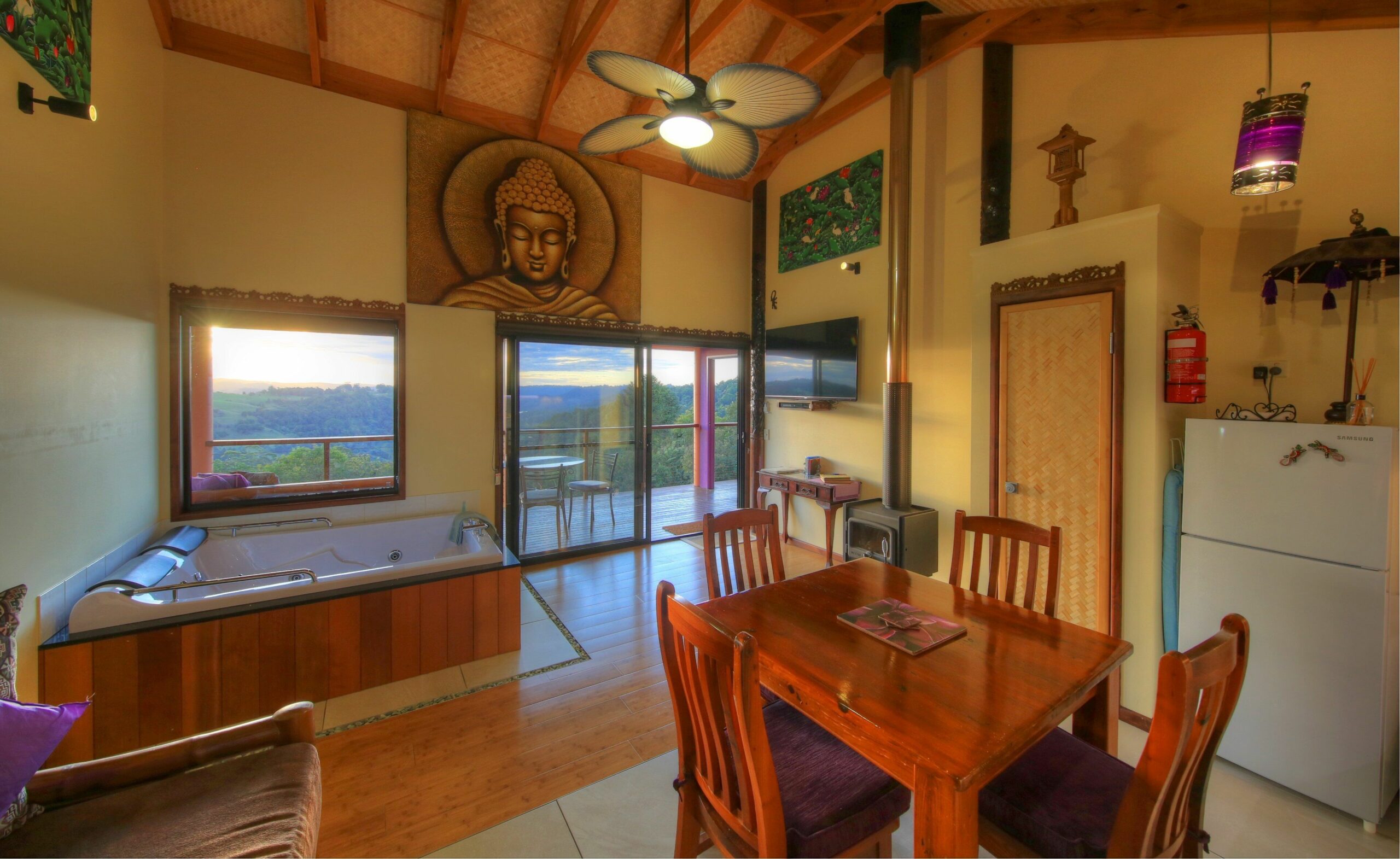 Luxury self-contained villa with two rooms, king and queen beds, double spa, fireplace, and kitchen.