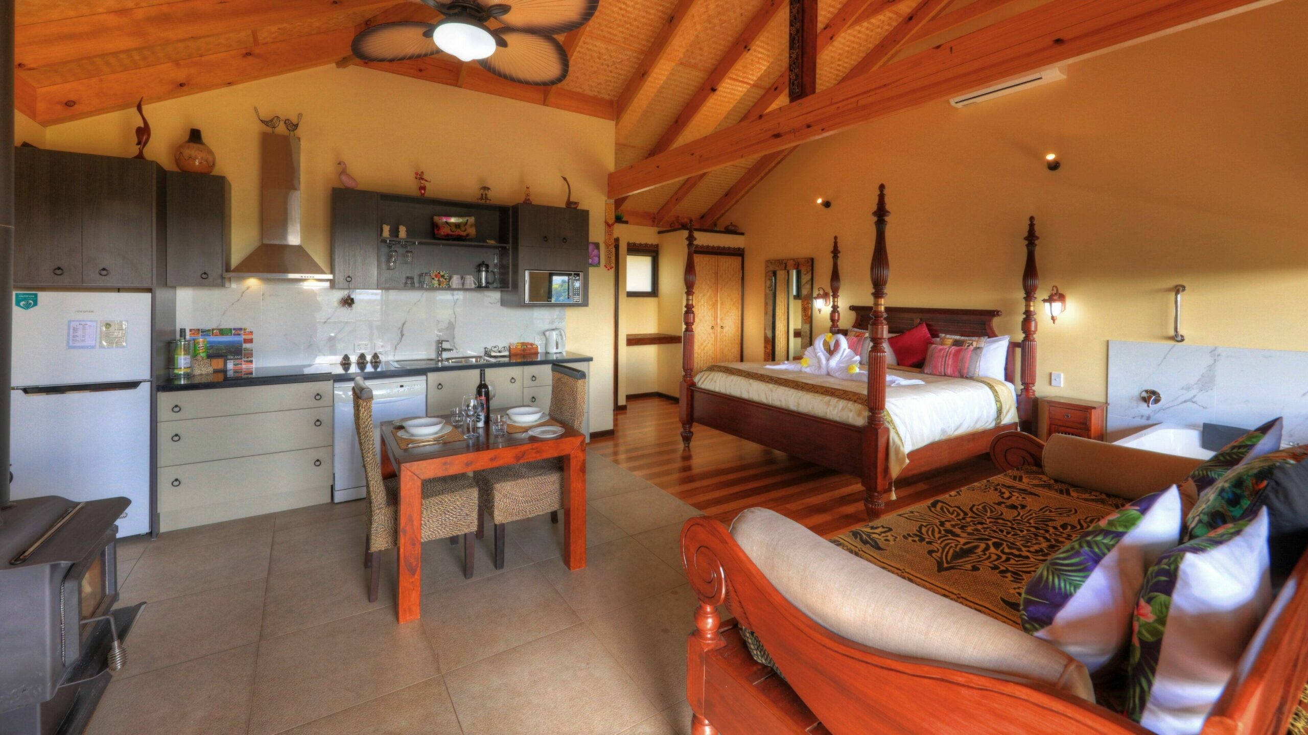 Luxury self-contained villa with double bed, double spa, fireplace, and kitchen.