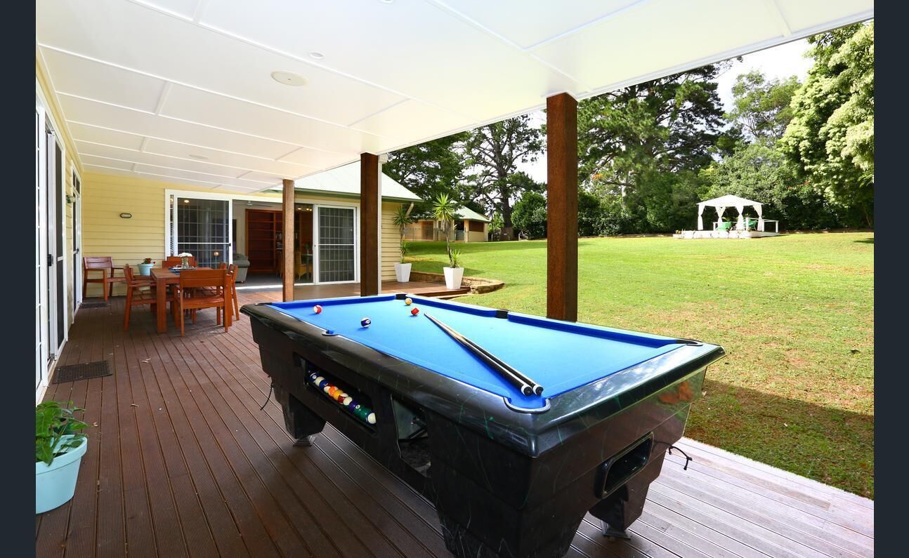 Sleeps 14 & has 4 bathrooms, pool table, pizza oven, spa pool, wood heater