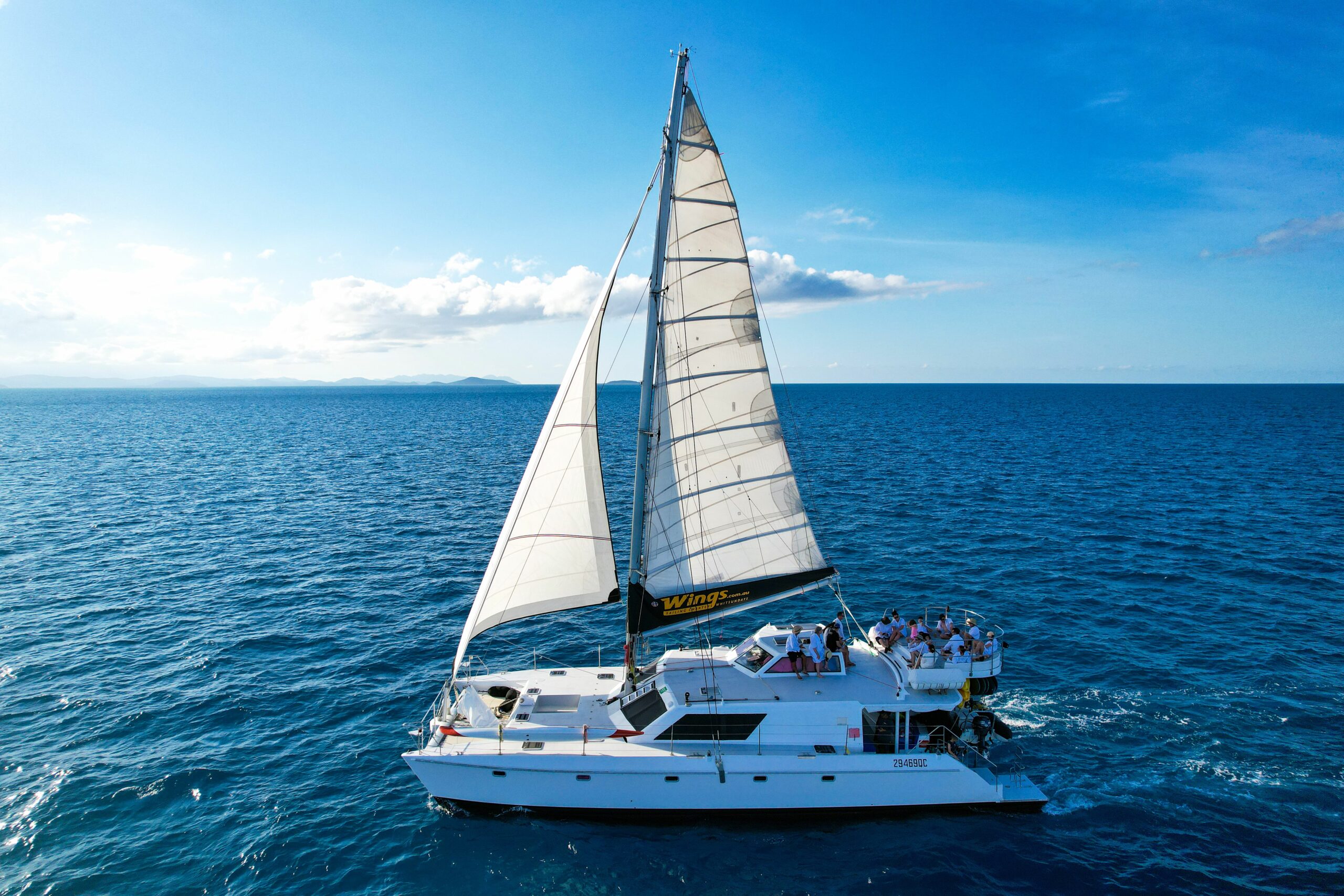 A Whitsunday Islands Sail, SUP & Snorkel Day Tour